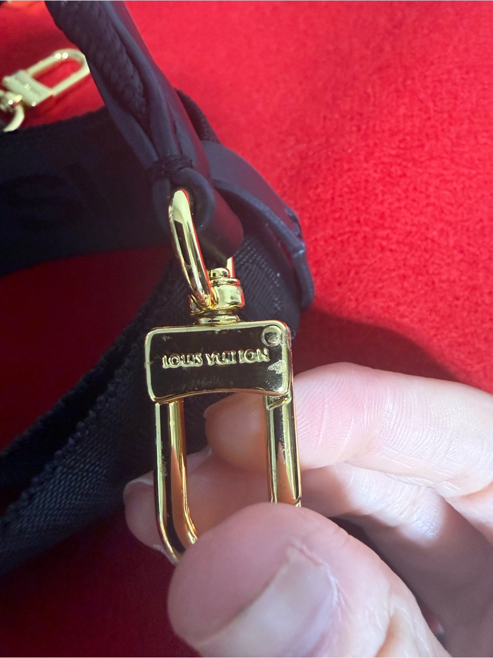 LVBlack Embossed Monogram Leather Pouch with Gold Hardware and shoulder straps - Picture 7 of 10
